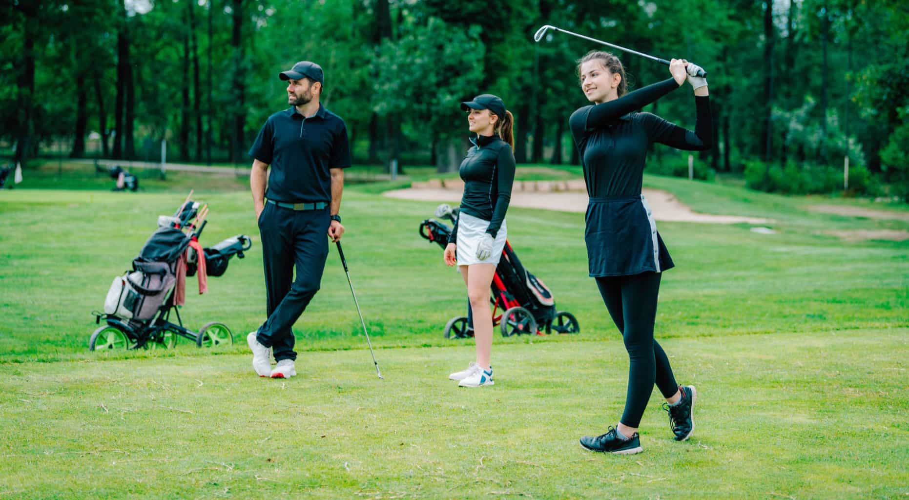 Young Woman Playing Golf with Friends